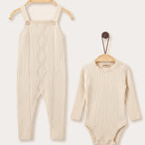 Knitted overall combined with beige bodysuit