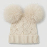Knitted hat with two pompoms - beige