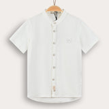 Button-down shirt with embroidered emblem - cream