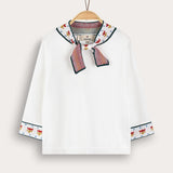 Ribbon-tied knit top - cream