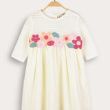 Festive dress with knitted flowers - cream