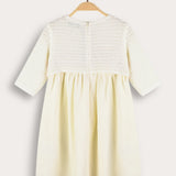Festive dress with knitted flowers - cream