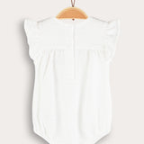 Baby overalls with embroidery - cream