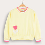 Girl's shirt with crocheted flower - yellow
