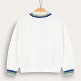 Girl's shirt with crocheted flower - white